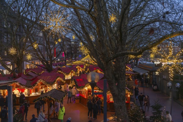 Christmas market on Holstenplatz in Kiel, city center, trees, shops, pedestrian zone, early