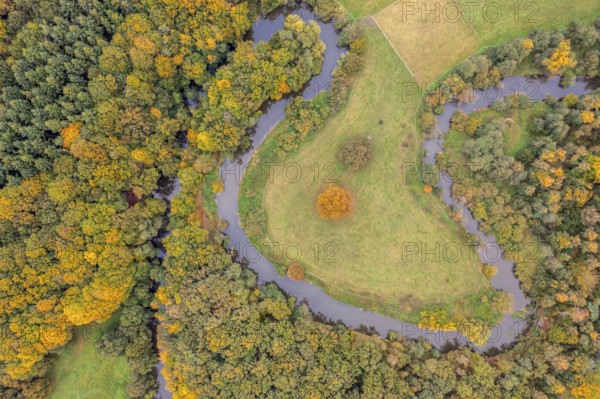 Aerial view of the winding Hunte river in autumn landscape Aerial view Vertical aerial view,