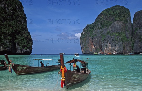 Longtail boats on Maya Bay beach, known from the movie The Beach, one year in front of the tsunami,