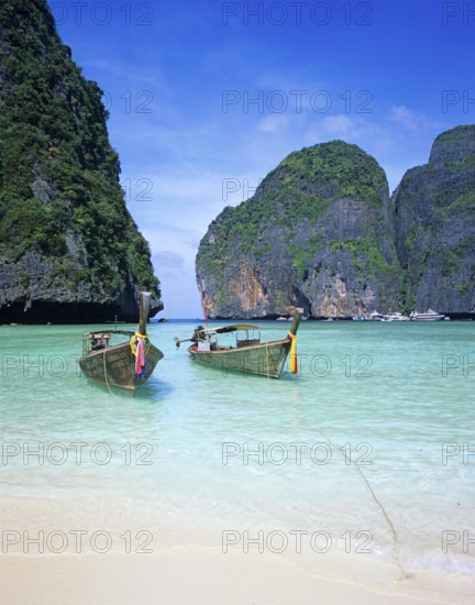 Longtail boats on Maya Bay beach, known from the movie The Beach, one year in front of the tsunami,