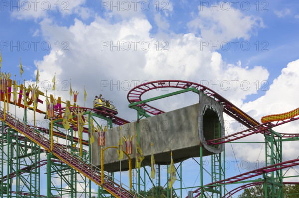 Wilde Maus, little rollercoaster for children, fairground in Friedrichsau Ulm, public festival,