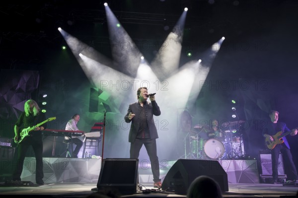 Claudius Dreilich, singer of Karat live on 50 years of KARAT tour in Berlin's Max-Schmeling-Halle