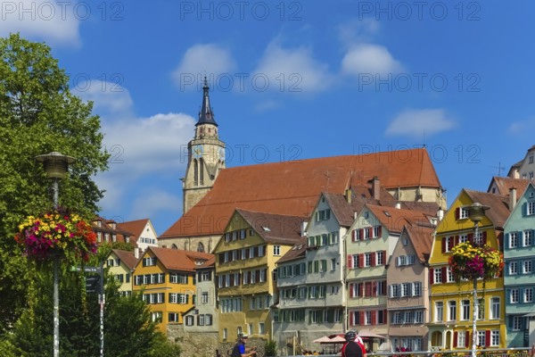 Historic old town, Neckar front, houses, colorful facades, collegiate church, people, cyclists,