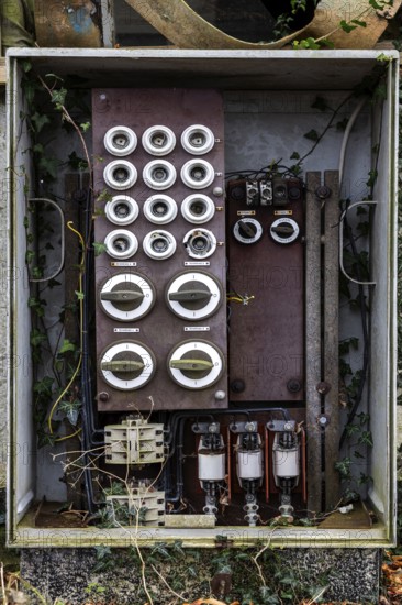 Old power box, dilapidated plant of a former agricultural production cooperative of the former GDR,