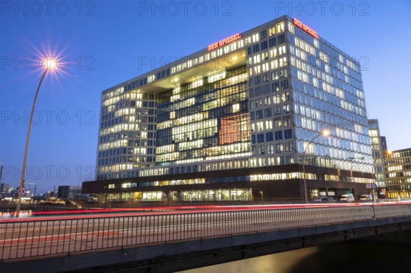 Mirror building on Ericusspitze Hamburg at blue hour with light strips and light trails from