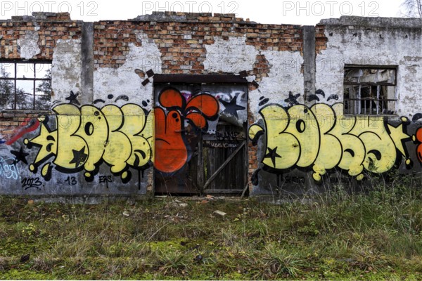 Dilapidated hall of the dilapidated plant of a former agricultural production cooperative of the