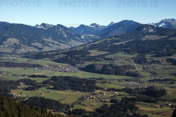 View from the Bolsterlanger Horn of villages in the Illertal and mountains of the Allgäu Alps,