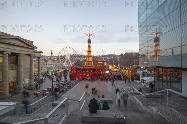 Stuttgart 2025 Christmas market on Schlossplatz with festive lights, a Christmas pyramid, mulled
