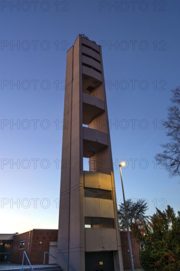Bell tower of Nicodemus Church in the evening, Röthenbach near Schweinau district, Nuremberg,