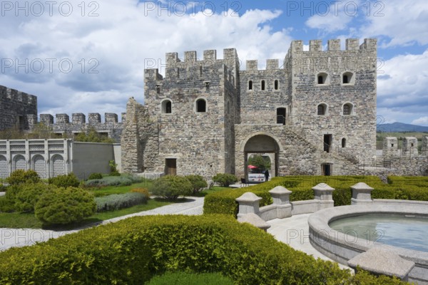 Historic stone fortress with round tower, well-kept garden and round fountain, Rabati fortress,