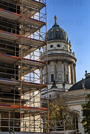 Scaffolding at Gendarmenmarkt with a view of the German Cathedral in the background, Berlin,