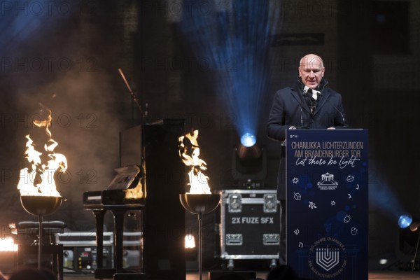 Kai Wegner (Governing Mayor of Berlin) speaks at the lighting of lights to mark 20 years of