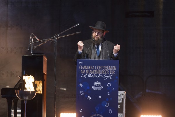Yehuda Teichtal (Rabbi of the Chabad-Lubavitch movement) speaks at the lighting of lights to mark