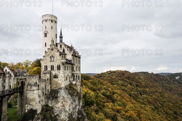 Castle and autumnal forest, Lichtenstein Castle, Honau, Echaz Valley, Swabian Jura,