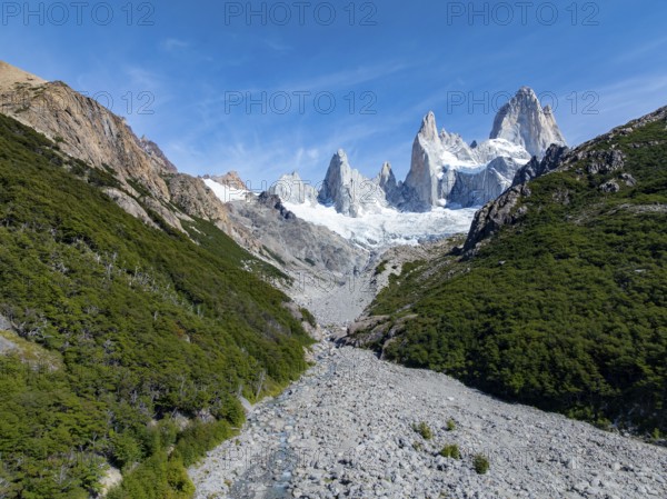 Epic panorama, rocky mountain landscape, glacier and summit of Monte Fitz Roy in the background,