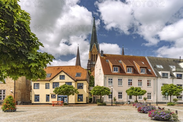 The Town Hall Market in Schleswig's Old Town and St. Peter Cathedral, City of Schleswig,