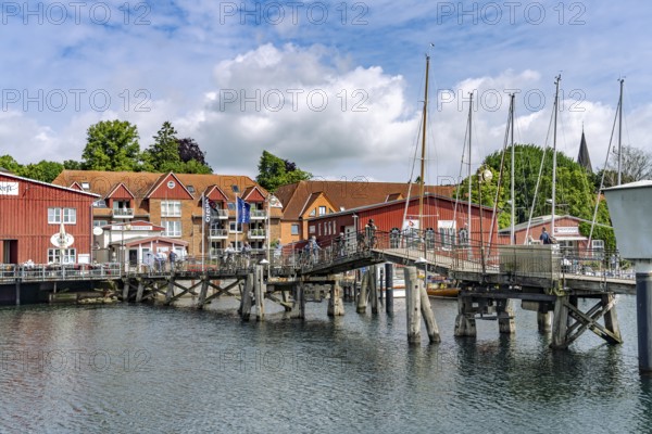 Eckernförde wooden bridge and the Siegfried shipyard at the inland port in Eckernförde,