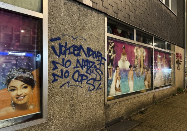 Facade smeared with Ückendorf No Nazis No Cops in one of the poorest cities in Germany,