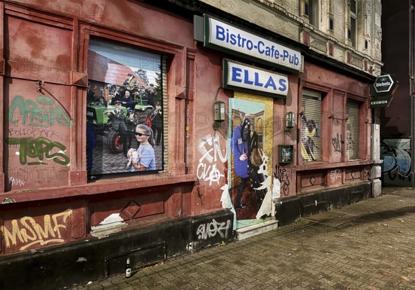 Decaying façade covered with graffiti in a difficult district, Gelsenkirchen, Ruhr area, North