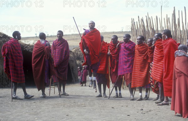 Maasai men showing traditional jumps, Ngorongoro Crater, Tanzania, Africa, June 2000, vintage,