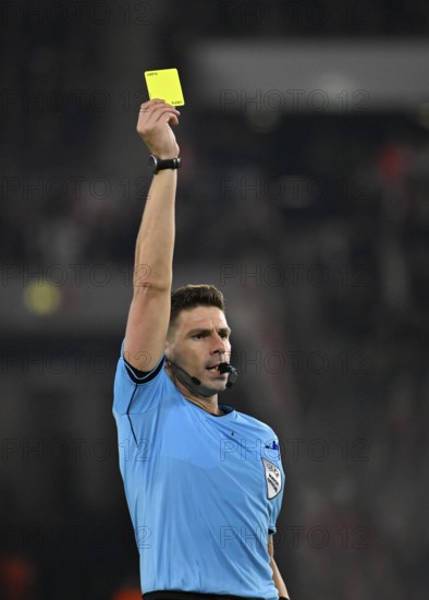 Referee Referee Marian Barbu (ROU) Gesture Gesture shows yellow card yellow caution Europa League,