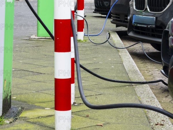 Several cars are charged at charging stations in Düsseldorf, Germany