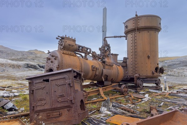 Steam engine at abandoned marble quarry Camp Mansfield, Ny London near Ny-Alesund,