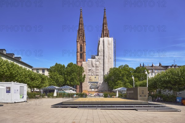 St. Boniface Catholic Church, scaffolding, renovation, concrete paving square, trees, general