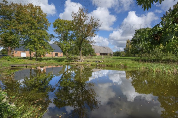 Historic horse stable and barn with pond, 1923, at the Othenstorf estate, Othenstorf,