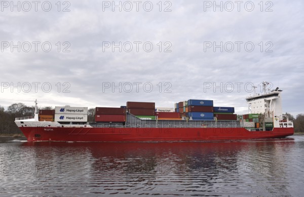 Container ship, RUTH sails in the evening in the Kiel Canal, NOK, Kiel Canal, Kiel Canal,