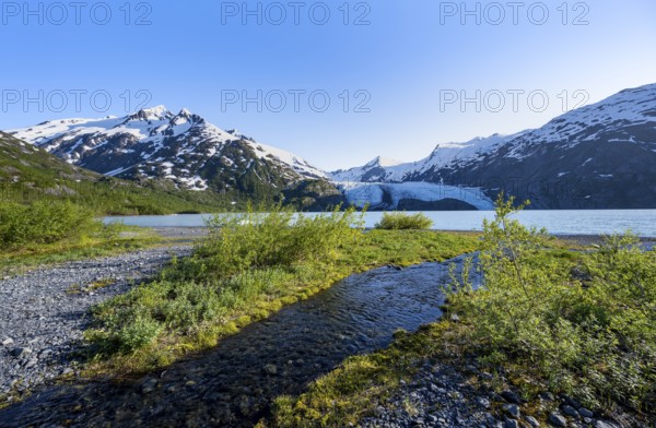 On the shores of Portage Lake, Snowy Mountains and Glaciers Portage Glacier, Chugach National