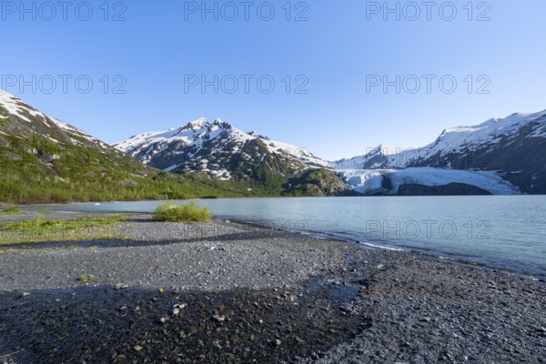 Snowy mountains and glaciers Portage Glacier on Portage Lake glacial lake, Chugach National Forest,