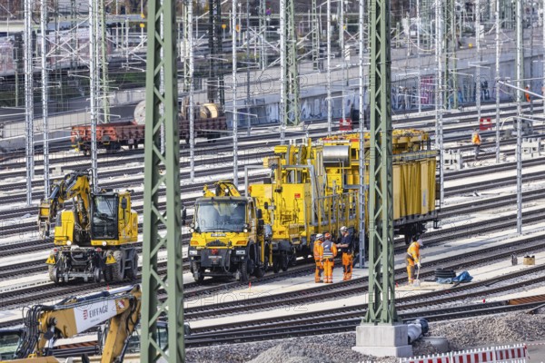 Rail construction crews with a work train. New parking station in Untertürkheim. As part of