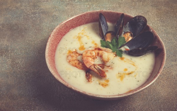 Cream soup, chowder with mussels and shrimp, American cuisine, homemade, no people