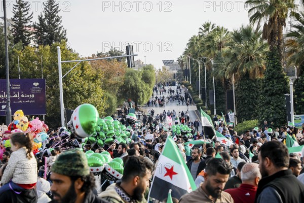 Damascus, Syria. November 28, 2025: Thousands of Syrians gather in Umayyad Square in central