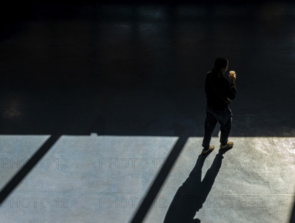 Foyer in a building of the Technical University of Berlin, light and shadow from people at the