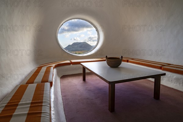 Sitting area with a view of the Volcán de la Corona volcano, interior at the Mirador del Río