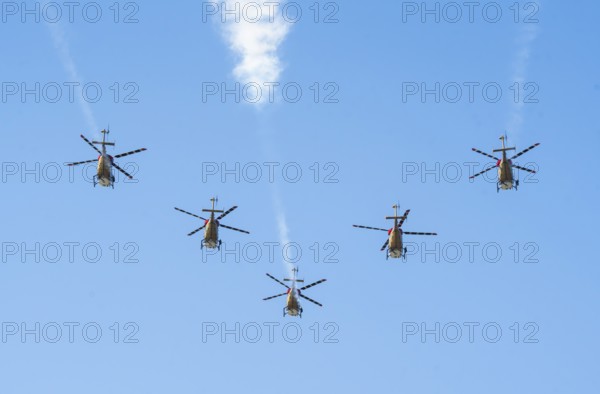 Indian Air Force aerobatic team performs during rehearsals ahead of the air show organised as part