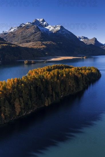 Mountain landscape, mountain lake, larch forest, autumn, autumn color, morning light, sunny, aerial