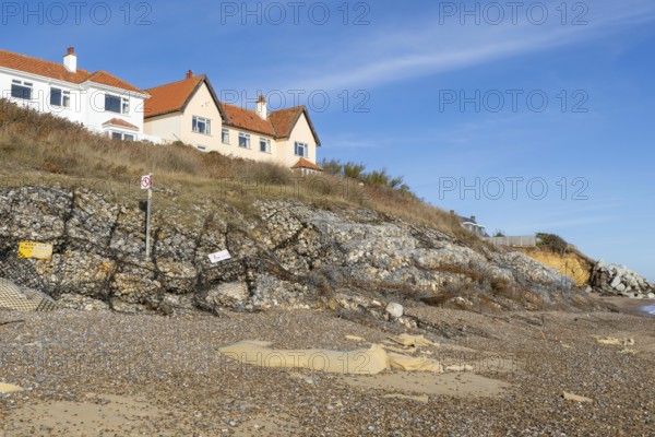 Clifftop houses at risk from coastal erosion, Thorpeness, Suffolk, North Sea coast, England, UK