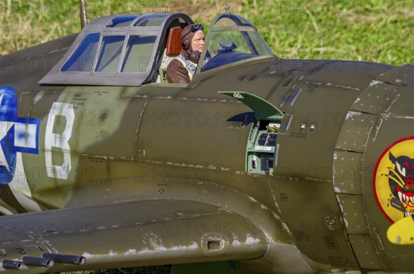 An RC model of a Republic P-47 Thunderbolt during a demonstration as part of an air show at the