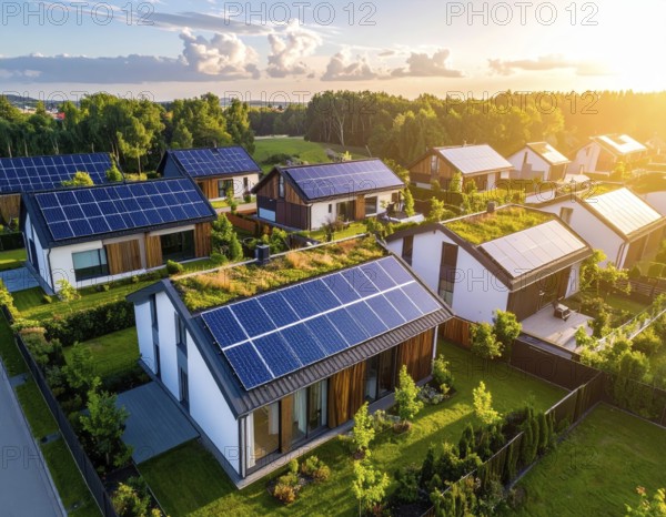 Aerial view showcases modern houses with solar panels and green roofs in a suburban setting,