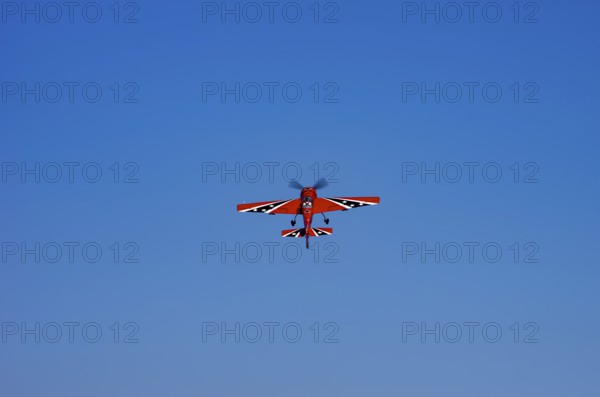 A Soviet Jakovlev Jak-55 sport aircraft with the registration LY-TOY during a flight demonstration
