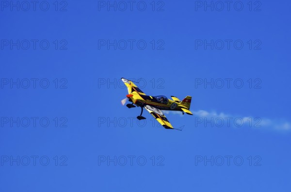 A Votec 351 sport aircraft from the Swiss MSW Aviation AG with registration HB-YMV during a flight