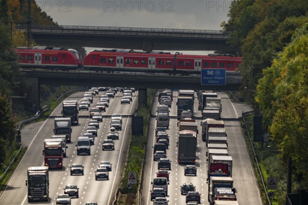 Local train crossing the A3 motorway between the Hilden junction and the Mettmann junction, view to