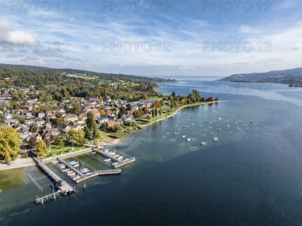 Aerial view of the village of Wangen on the Höri peninsula with boat moorings and jetty on the
