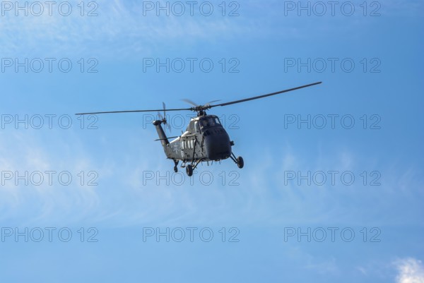 A Sikorsky S-58C transport helicopter in the colours of the German Army with the registration