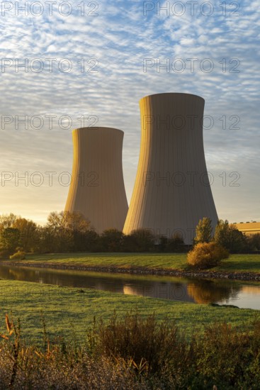 View across the Weser to the cooling towers of the Grohnde nuclear power plant in the morning