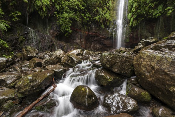 A large waterfall and many small watercourses pour down onto the rocks in the mystical 25 Fontes