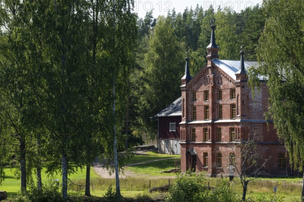 Brick factory building, former paper factory and mill for the production of groundwood pulp board,